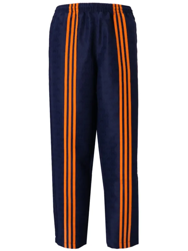 Blue and orange track pants best sale