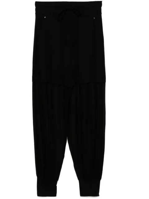 Thom Krom pants a capas