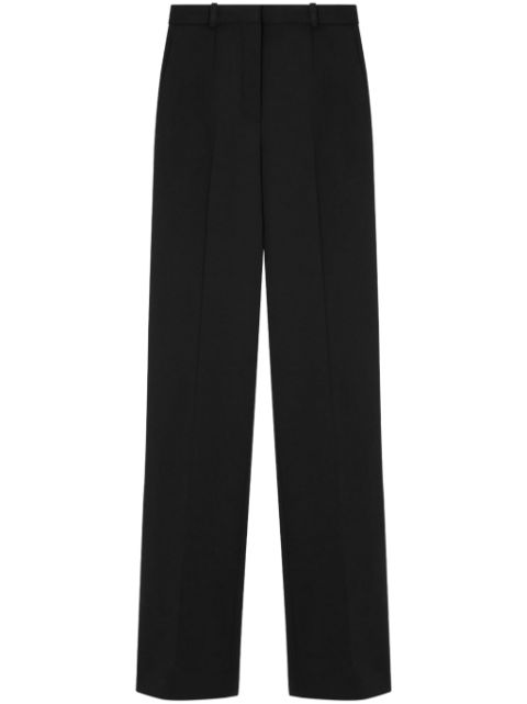 Versace logo-patch trousers