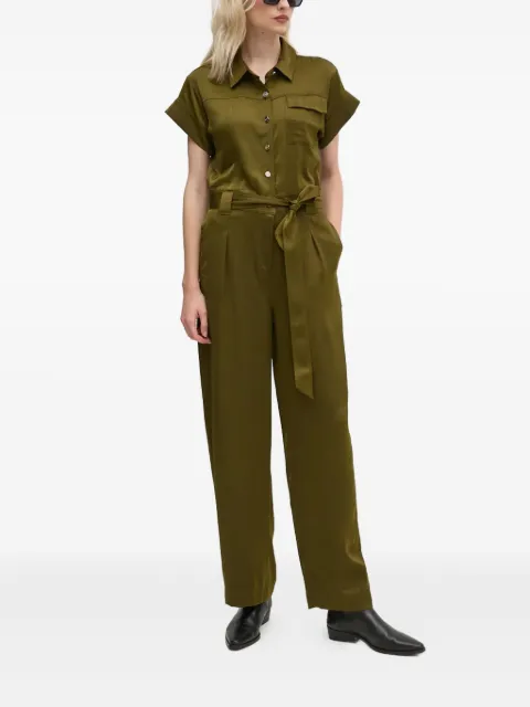DKNY jumpsuit con cinturón
