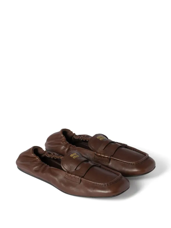 Miu Miu embossed-logo Loafers | Brown | FARFETCH