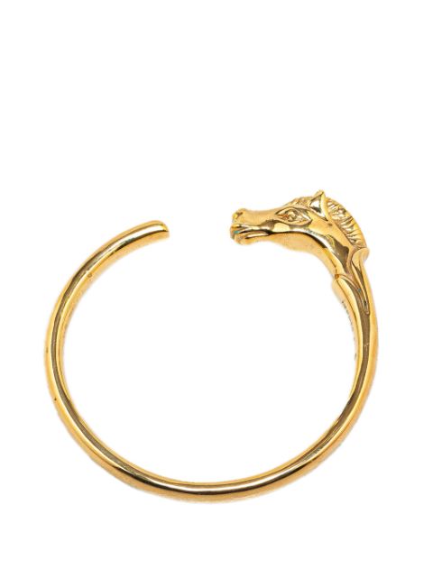 What You Need to Know Before Buying Hermes 20th Century Gold Plated Tete de Cheval Horse Bangle costume bracelet Women