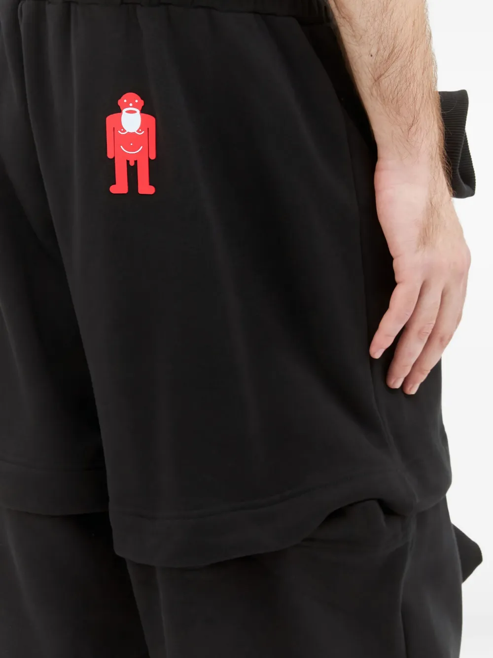 Walter Van Beirendonck Gelaagde broek met uitgesneden details Zwart