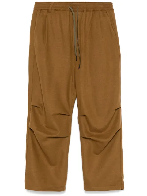 White Mountaineering pantalones con pinzas