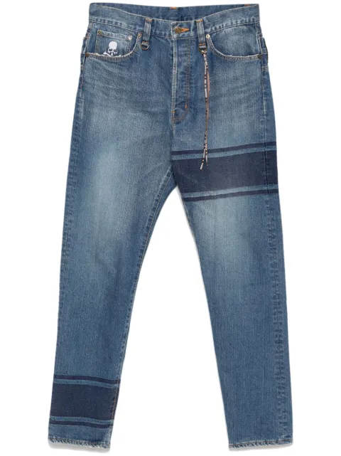 Mastermind World jeans con detalle de rayas
