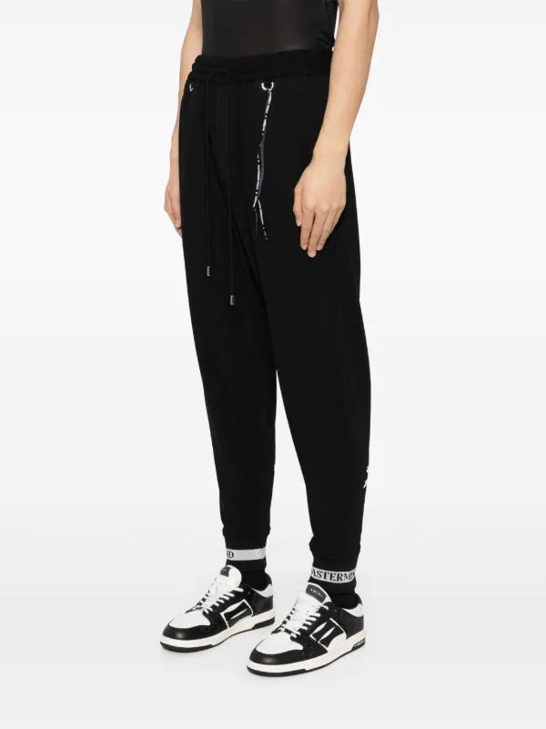 Mastermind World Logo Print Track Pants | Black | FARFETCH