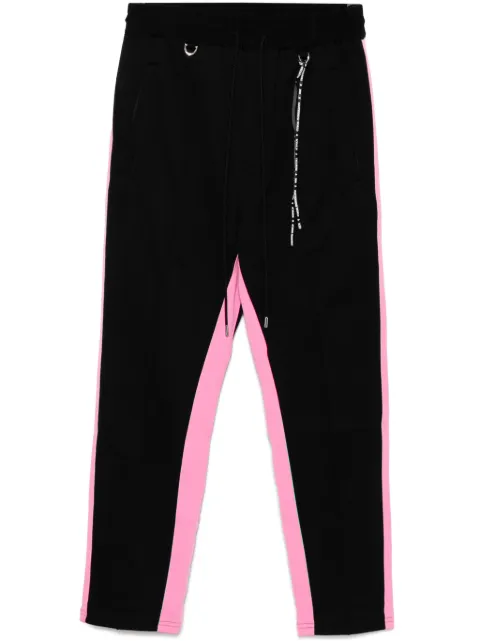 Mastermind World logo-patched track pants