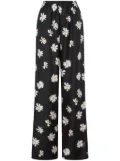 Moschino daisy-print trousers - Black