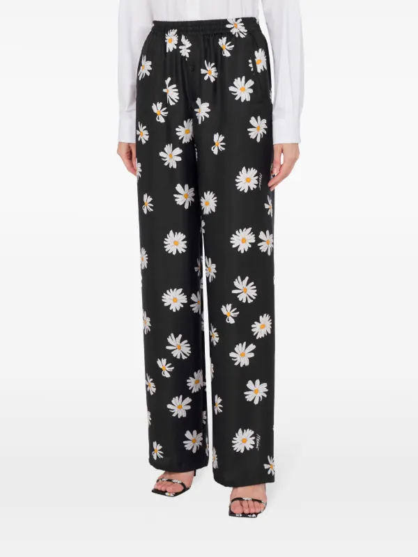 Moschino daisy-print Trousers | Black | FARFETCH