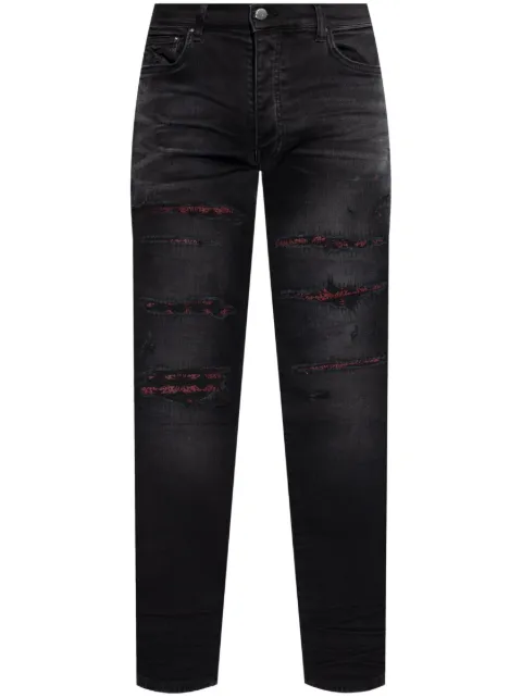 AMIRI jeans con detalle de bandana y efecto envejecido