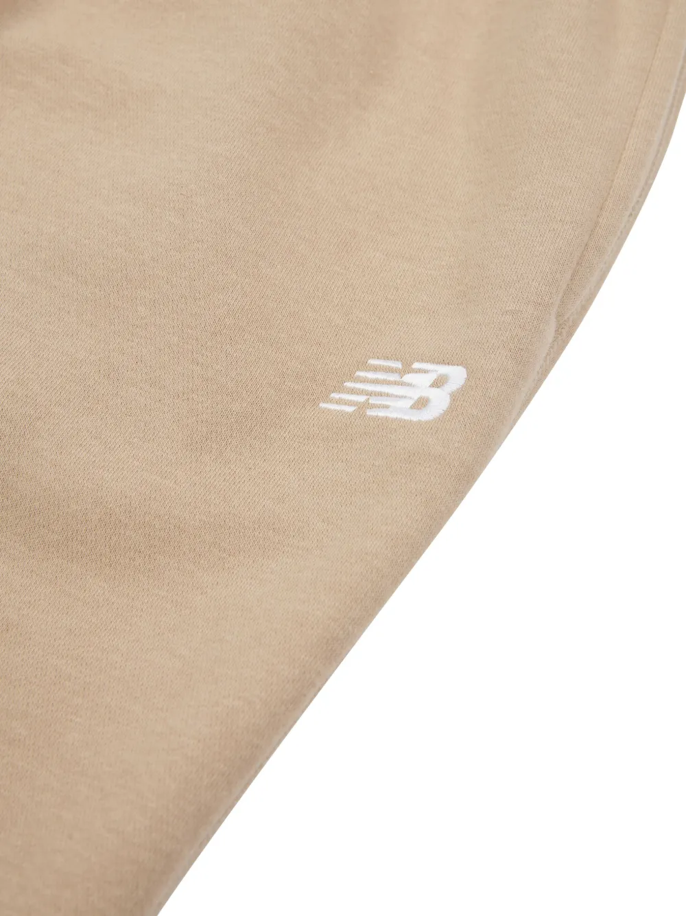 New Balance Kids Trainingsbroek met geborduurd logo Beige
