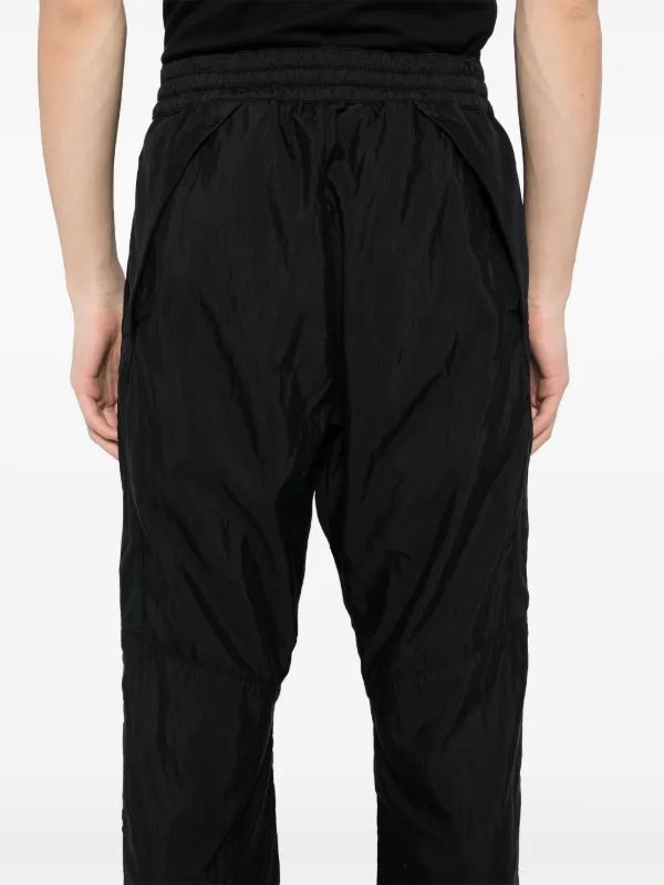 Nike all black track pants on sale