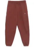 Nike Solo Swoosh track pants - Brown