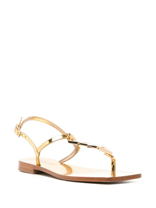 サンダル・ミュール VERSACE Sandals Women Leather Gold/Champagne Versace Leather T-strap Sandals | Gold | FARFETCH