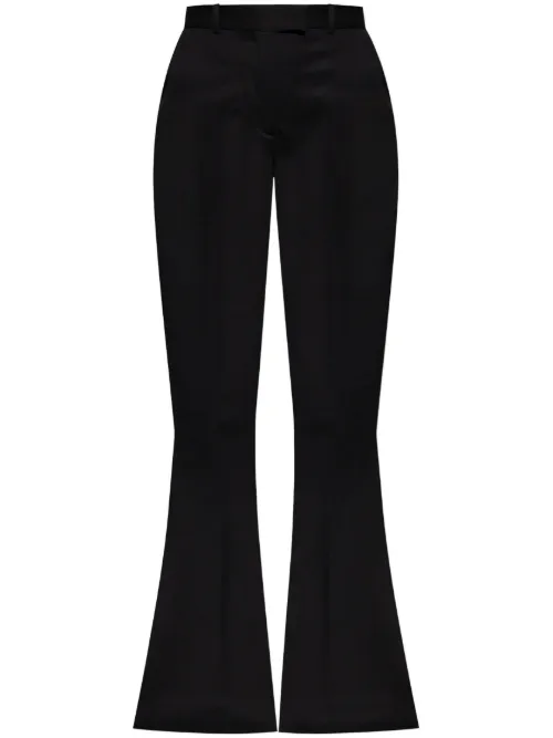 Pantalon en laine vierge à coupe évasée - The Attico - Modalova