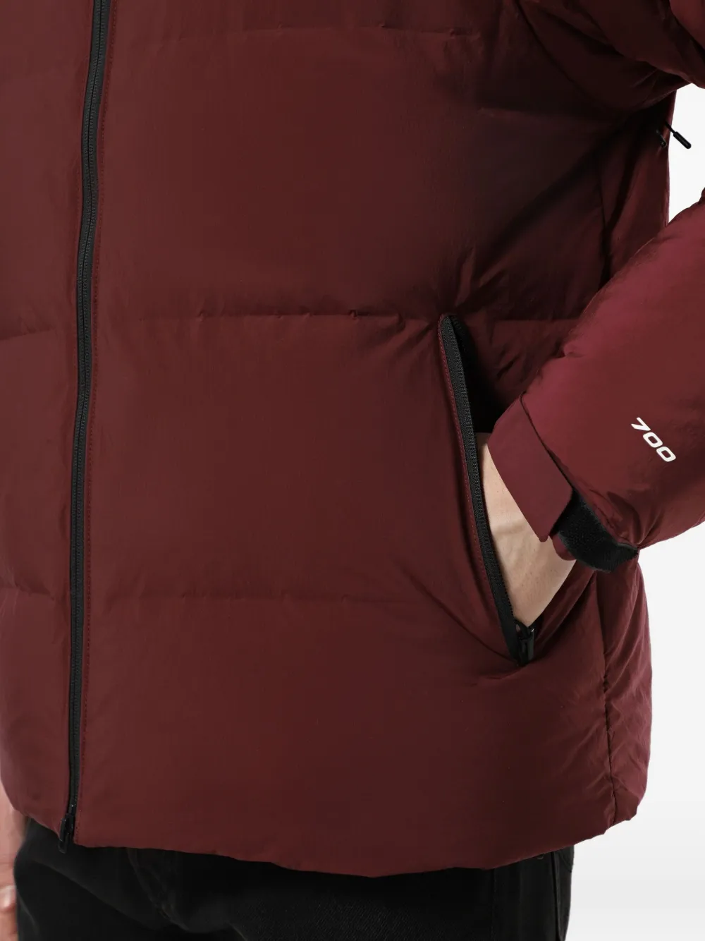 The North Face Himalayan Baltoro donsjack met capuchon Rood