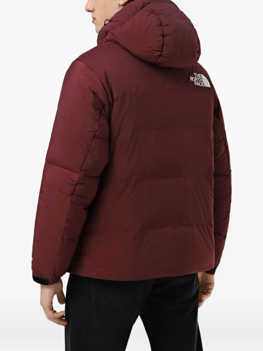 The North Face Himalayan Baltoro donsjack met capuchon Rood