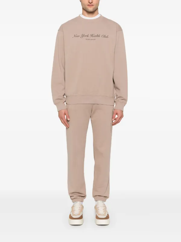 【Sporty & Rich】Running And Health Club Sweat Pants Ivory SPORTY & RICH Printed cotton-jersey track pants | NET-A-PORTER
