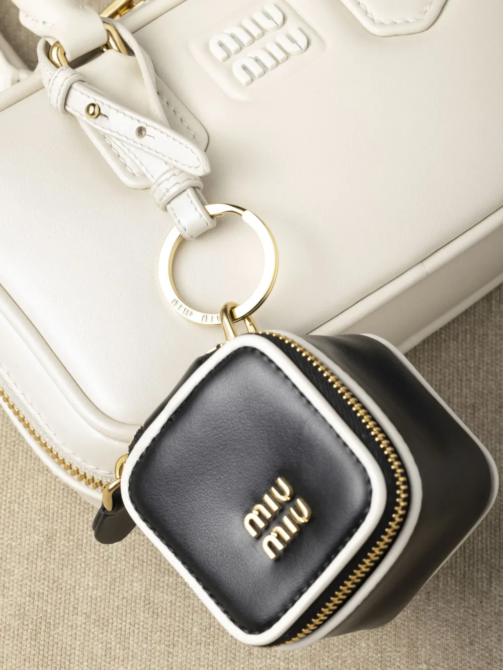 Miu Trick sleutelhanger Zwart