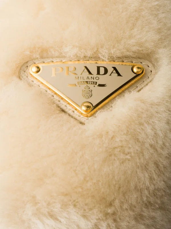 Prada Shearling Earmuffs | Neutrals | FARFETCH