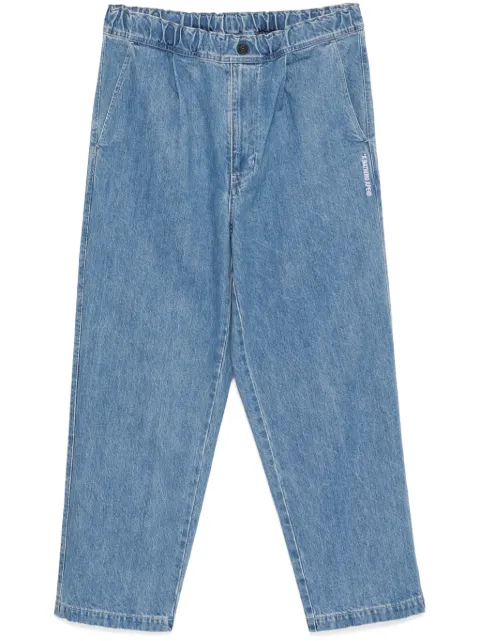 A BATHING APE® jeans con pinzas