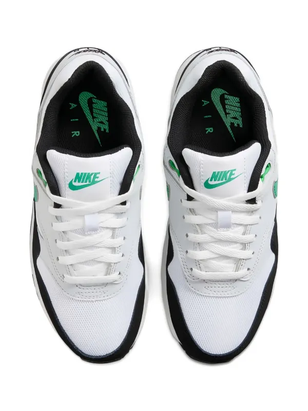 kids green nike trainers