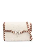 Valentino Garavani small Rockstud shearling shoulder bag - Neutrals