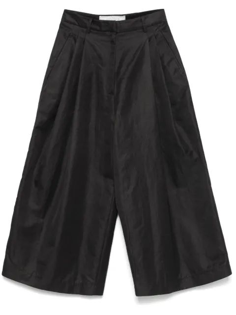 Société Anonyme pantalones Moga