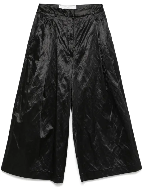Société Anonyme pantalones Moga