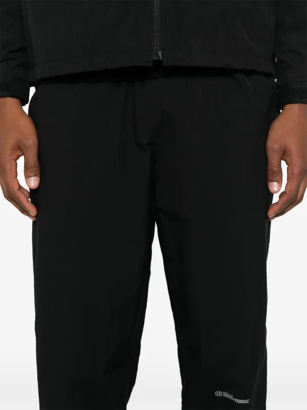 WTAPS Tussah Pertex Track Pants | Black | FARFETCH