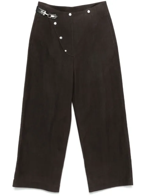 Nanushka pantalones con bolsillos