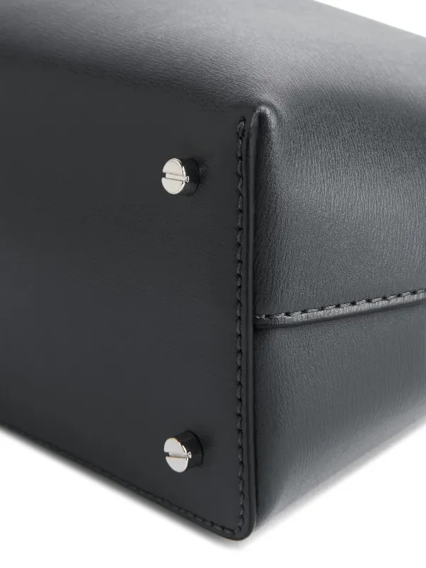 TOTEME T-lock Leather Clutch Shark | Black | FARFETCH