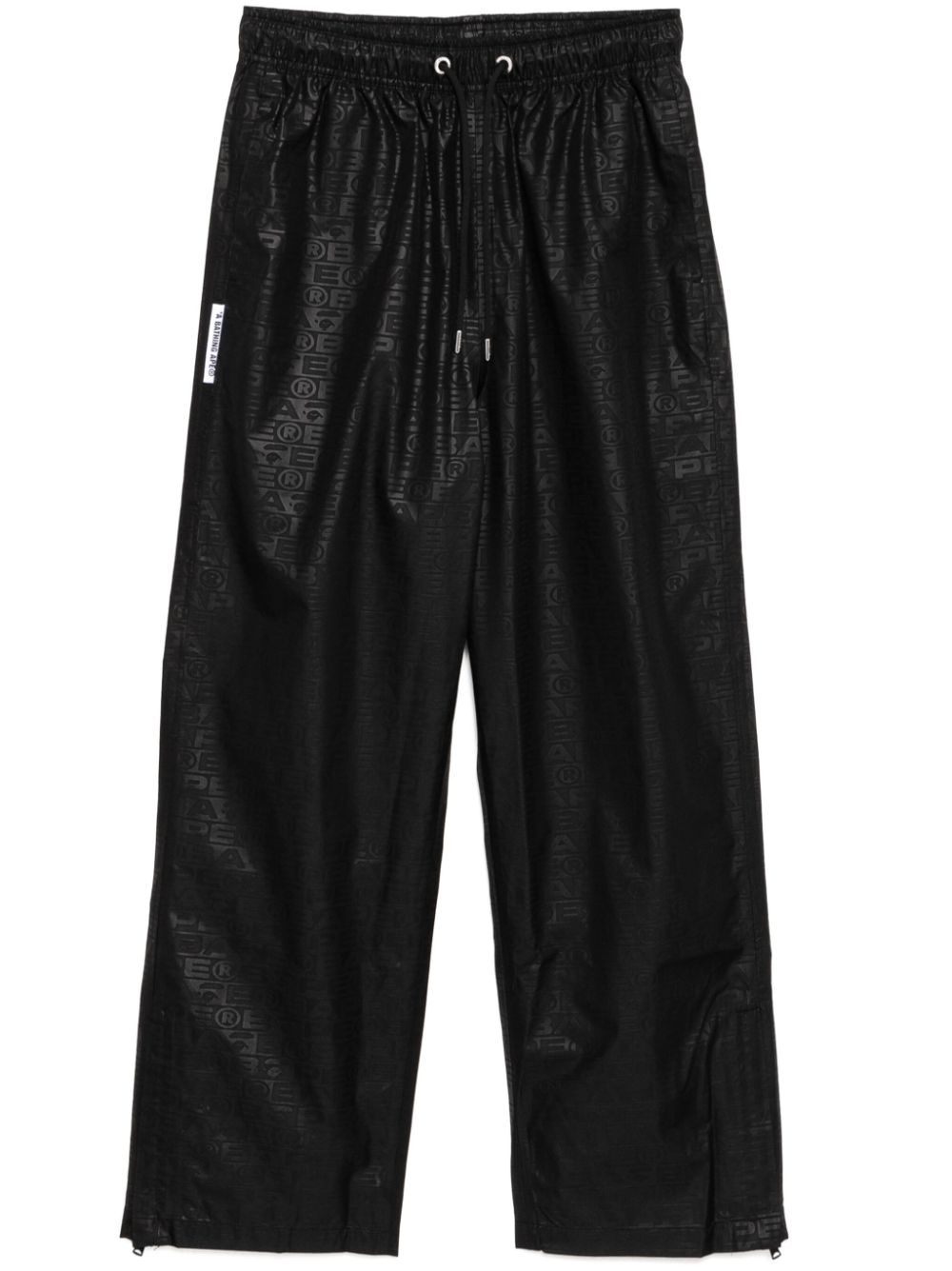 A BATHING APE® monogram-printed pants – Black