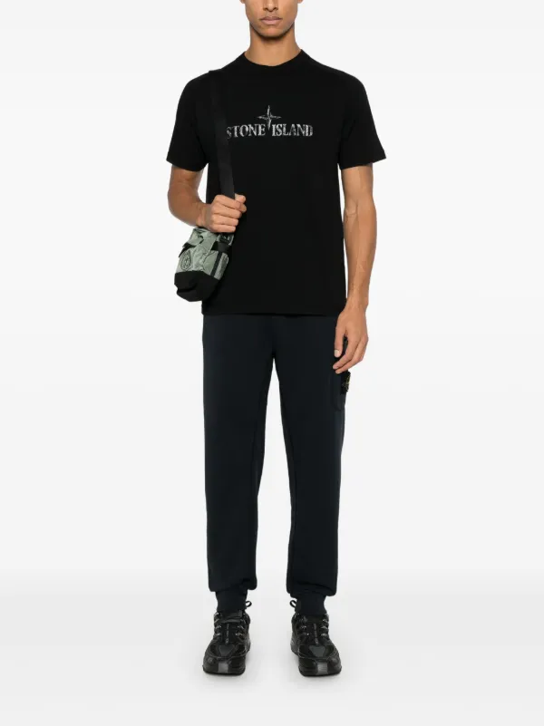 ストーンアイランドメンズパンツ コンパスバッチ トラックパンツ Stone Island コンパスバッジ トラックパンツ | ブルー | FARFETCH JP