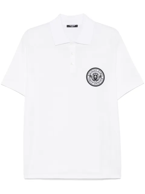 Balmain playera tipo polo con monedas estampadas