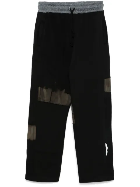 Stain Shade pants con paneles