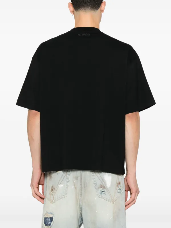 VETEMENTS ロゴ Tシャツ | ブラック | FARFETCH JP