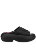 Love Moschino logo-embossed slides - Black