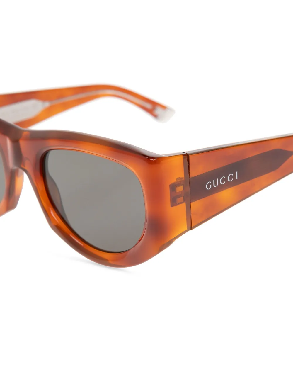 Gucci Eyewear Zonnebril met ovalen montuur Bruin