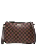 Sprayground core-embossed check clutch - Black