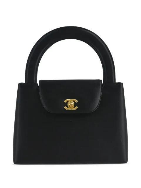 CHANEL Pre-Owned bolsa de mano satinada con logo CC 1997-1999
