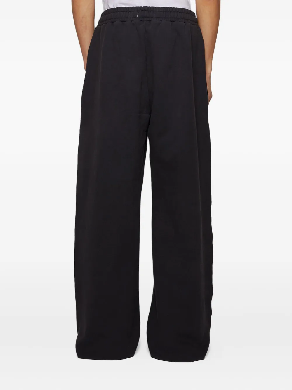 EARTHLING VIP Broek met wijde pijpen en split Zwart