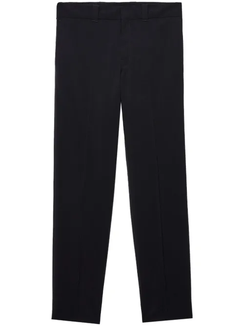 Pantalon à logo triangulaire - Prada - Modalova