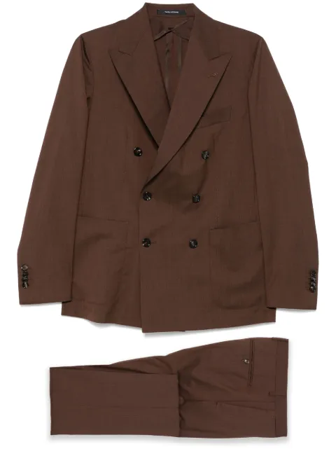 Tagliatore traje con botones