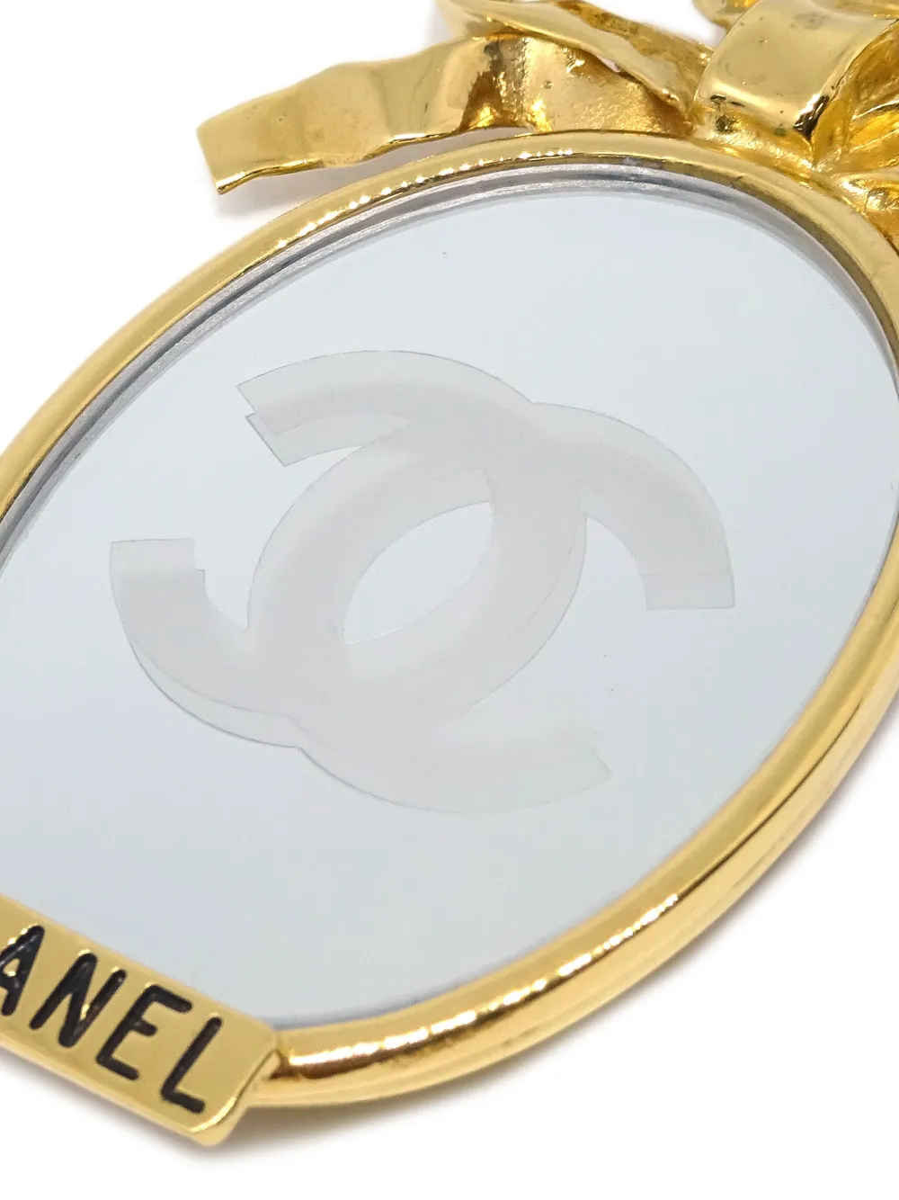 CHANEL Pre-Owned 1990-2000s spiegelende broche met strikdetail - Goud