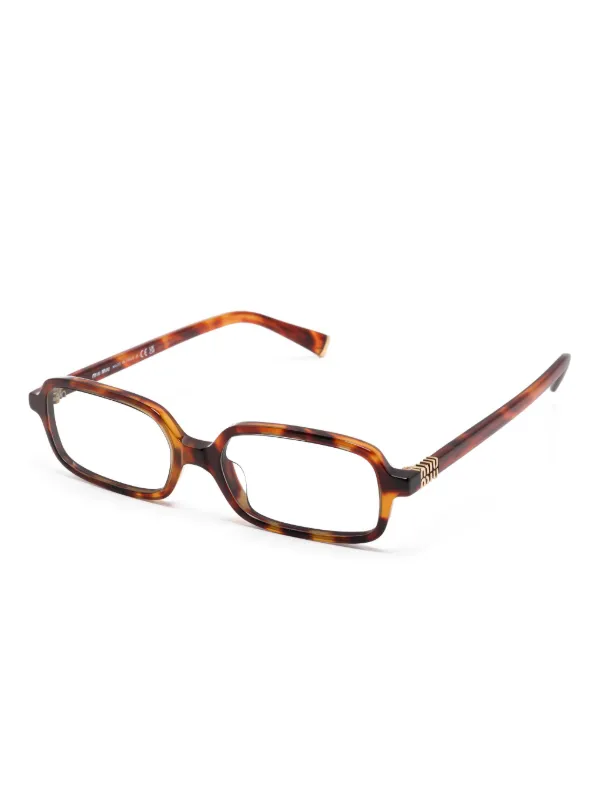 Miu Miu Eyewear 11ZS サングラス | ブラウン | FARFETCH JP