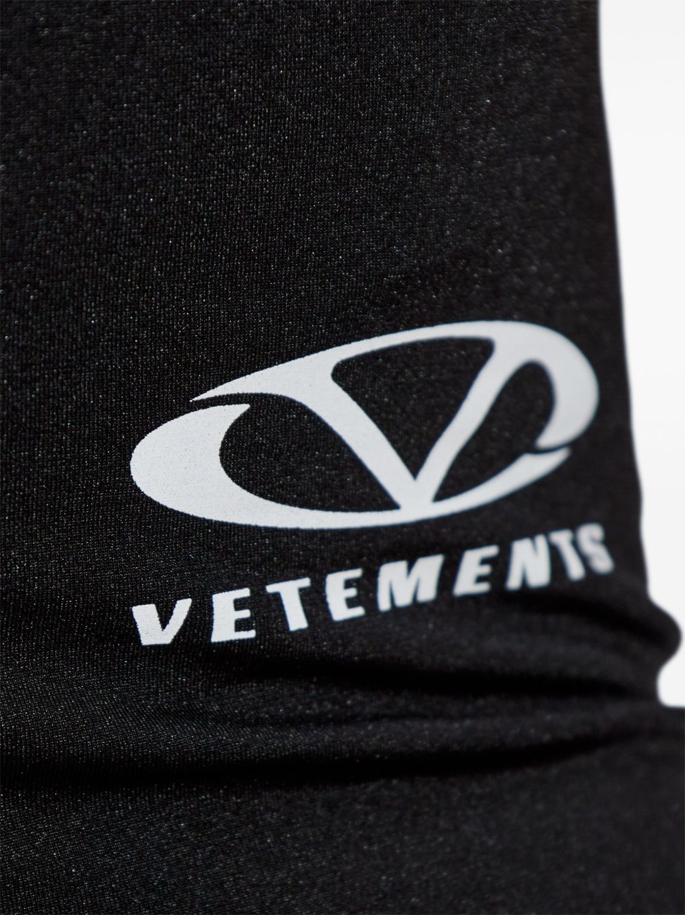 VETEMENTS LOGO-PRINT TRACK SHORTS