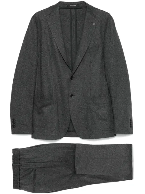 Tagliatore traje con botones