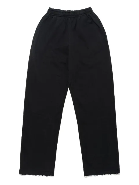 Mainless distressed track trousers