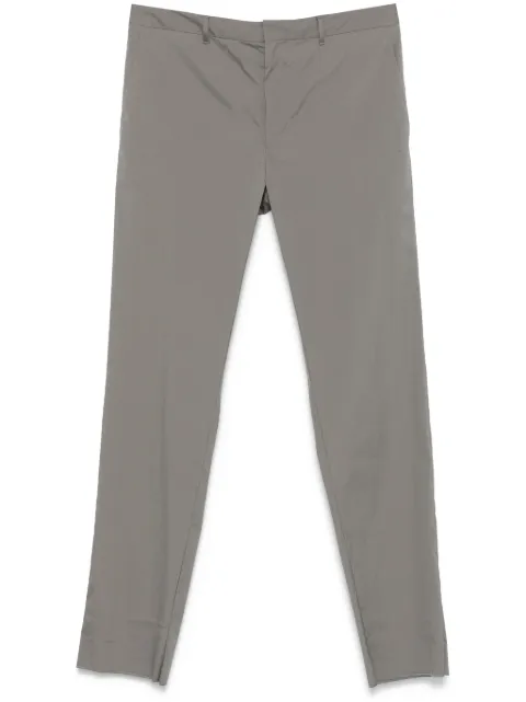 Prada triangle-logo trousers 